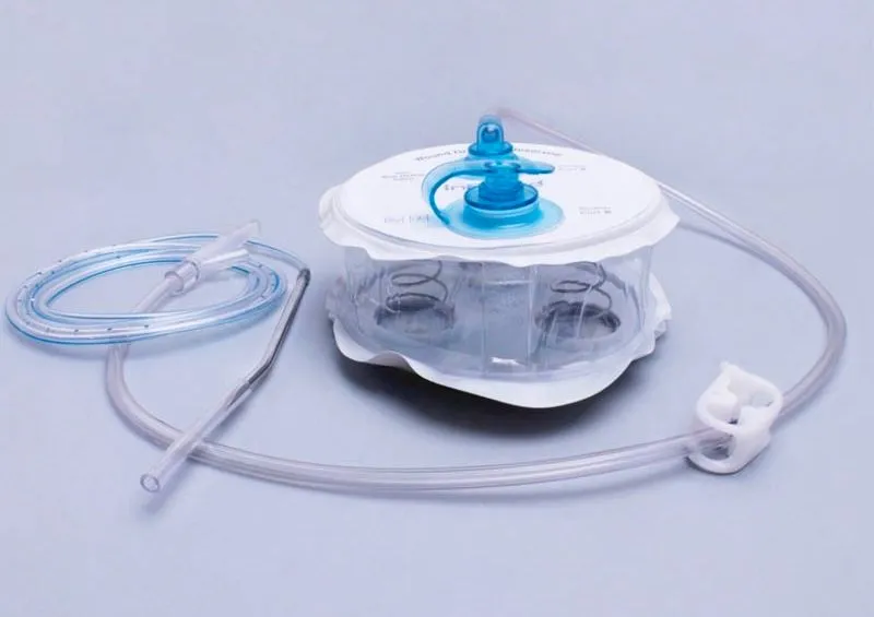 Wound Drainage System with Evacuator