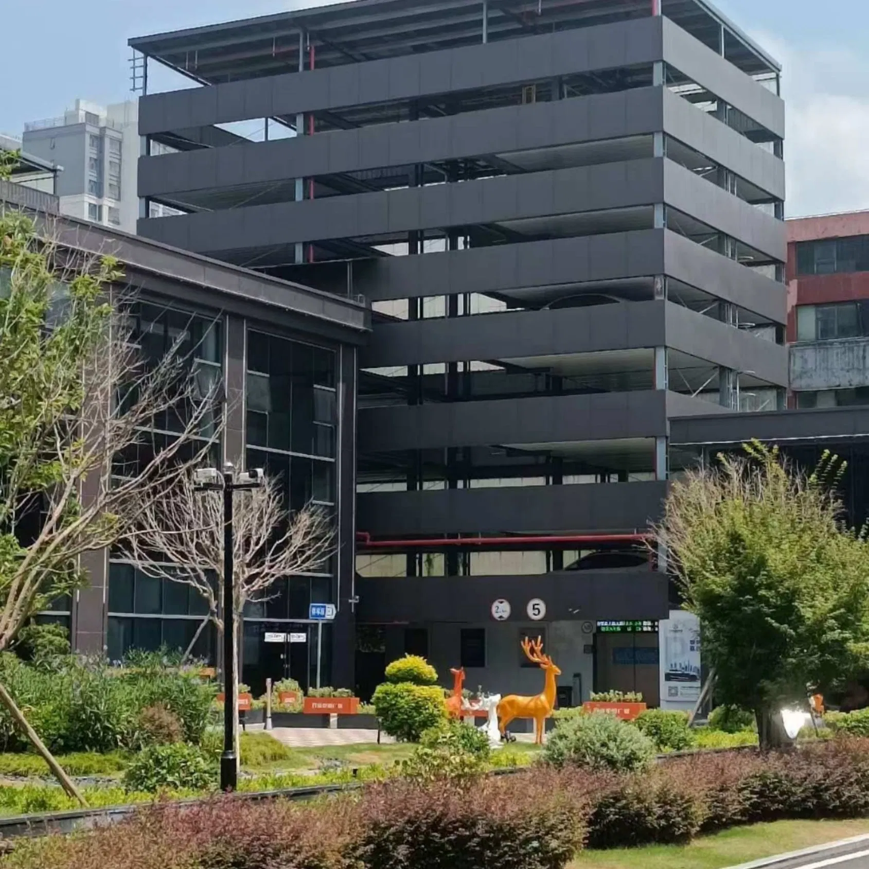 High Capacity Parking System Built on Circular Vertical Lift Parking with Contact Prevention