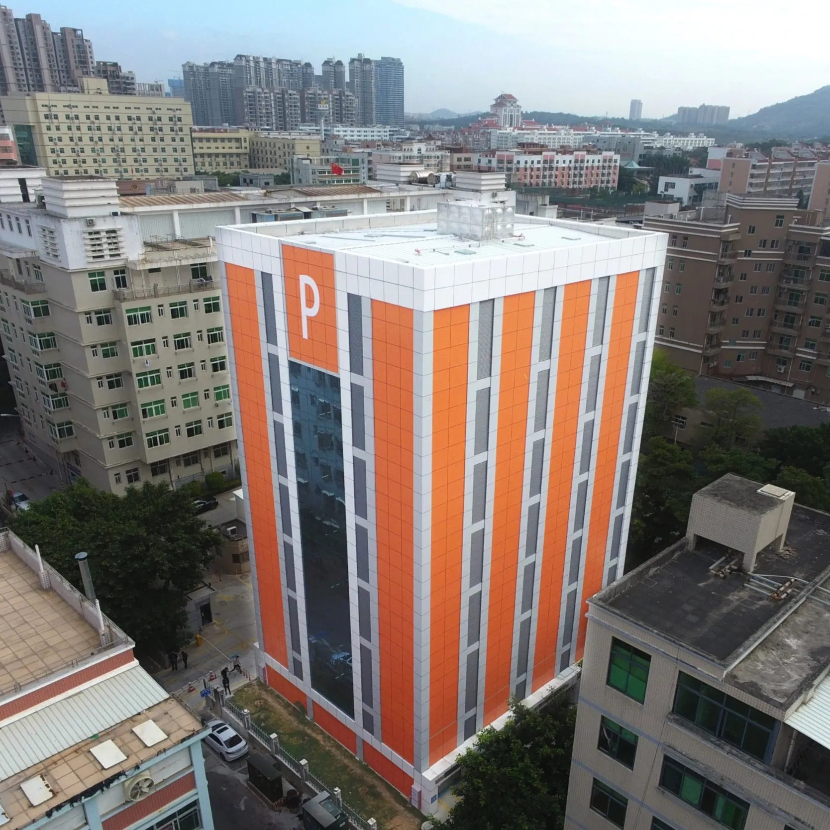 High Capacity Parking System Built on Circular Vertical Lift Parking with Contact Prevention