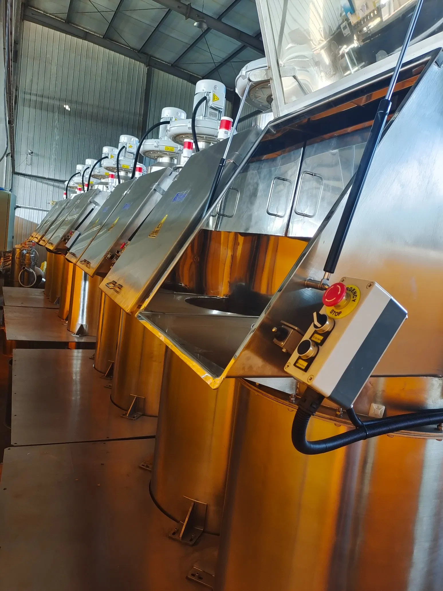 Sistema de Volcado Manual de Bolsas para Materiales en Polvo Alimentarios