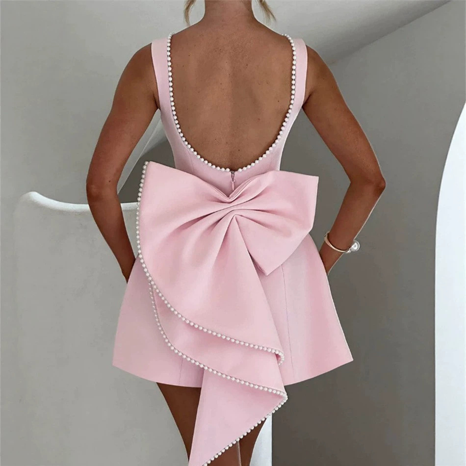 Vestido mini sin mangas negro en línea A para mujeres, con escote cuadrado, gran lazo en la espalda, vestido corto para cócteles y fiestas