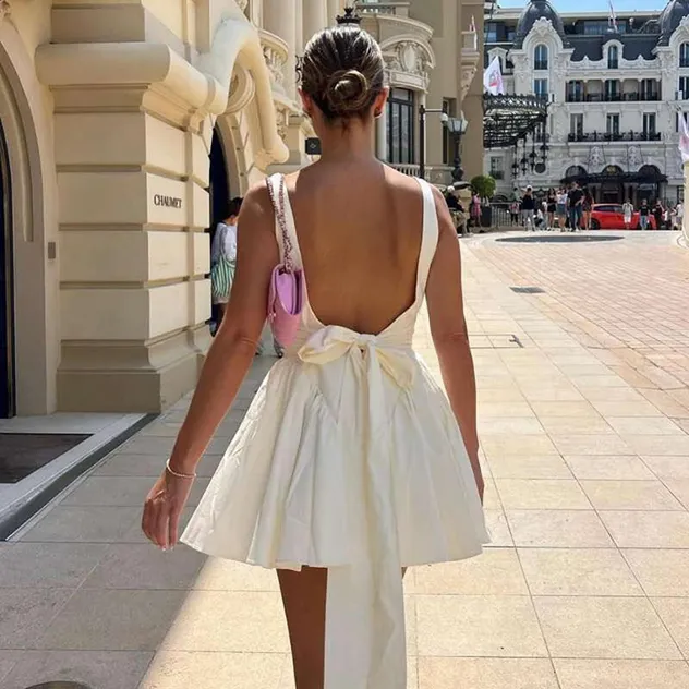 Vestido mini sin mangas de diseño personalizado de verano para mujeres, sexy y casual, con lazo en la cintura tejida, aspecto natural, vestido de fiesta