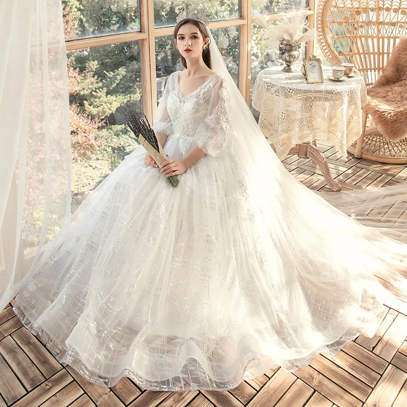 Cubierta de barriga de mujer, vestido de boda soñado de manga larga y grande