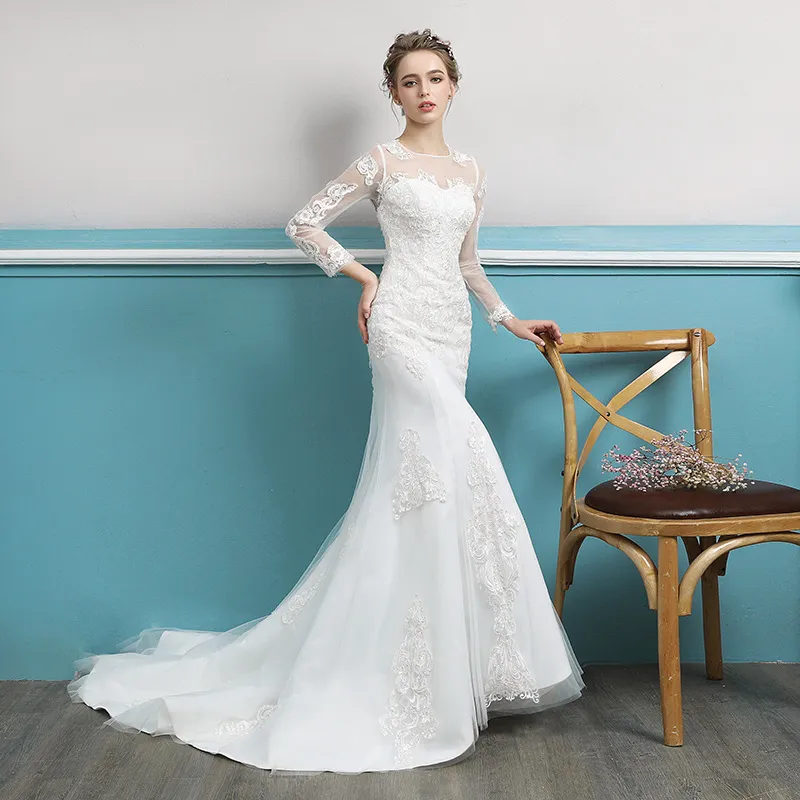 Detalle de encaje del vestido de novia