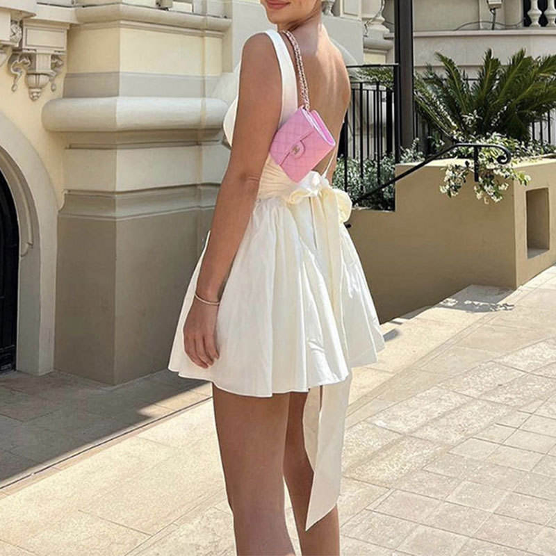 Vestido mini sin mangas de diseño personalizado de verano para mujeres, sexy y casual, con lazo en la cintura tejida, aspecto natural, vestido de fiesta