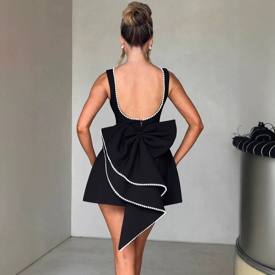Vestido mini sin mangas negro en línea A para mujeres, con escote cuadrado, gran lazo en la espalda, vestido corto para cócteles y fiestas