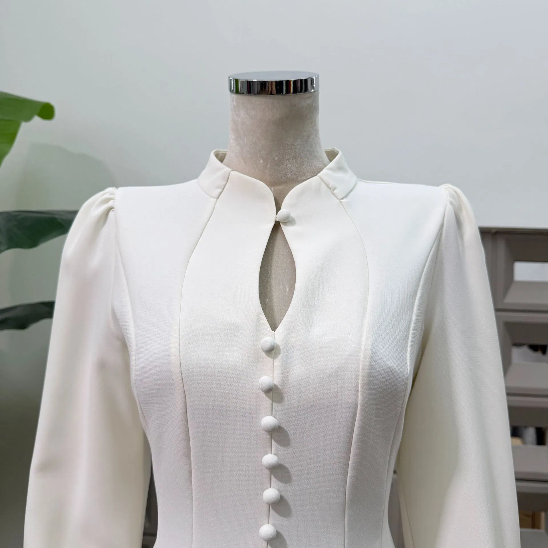 Ropa de boutique primavera nueva elegante falda corta para mujer ajustada de color puro vestido elegante de manga larga