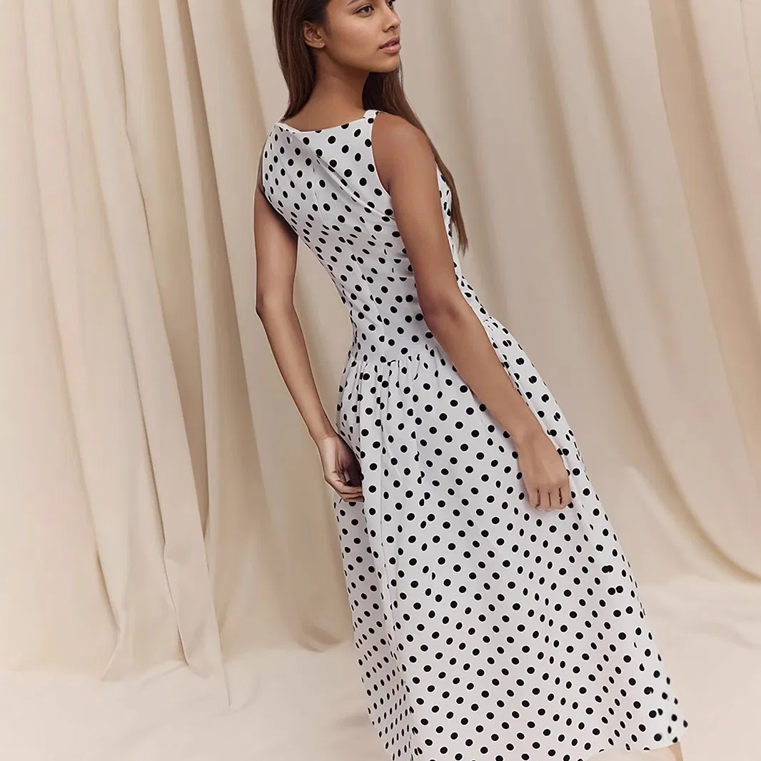 Vestido casual largo sin mangas de lunares personalizado y elegante para mujeres