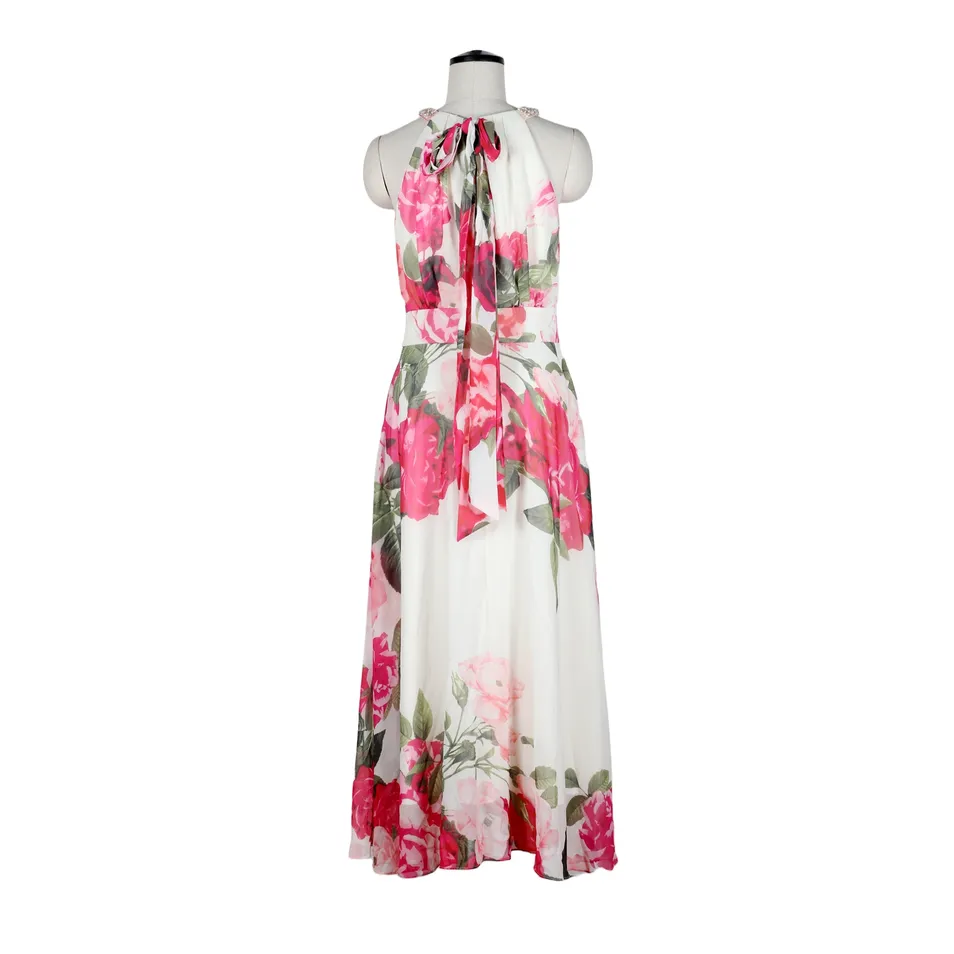 Vestido maxi de tirantes halter con estampado floral y cuello con cuentas, y lazo en la espalda para eventos formales y como invitada de boda