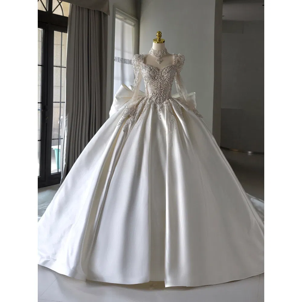 Vestido de novia de bola de encaje con mangas largas, perlas y cristales para mujeres