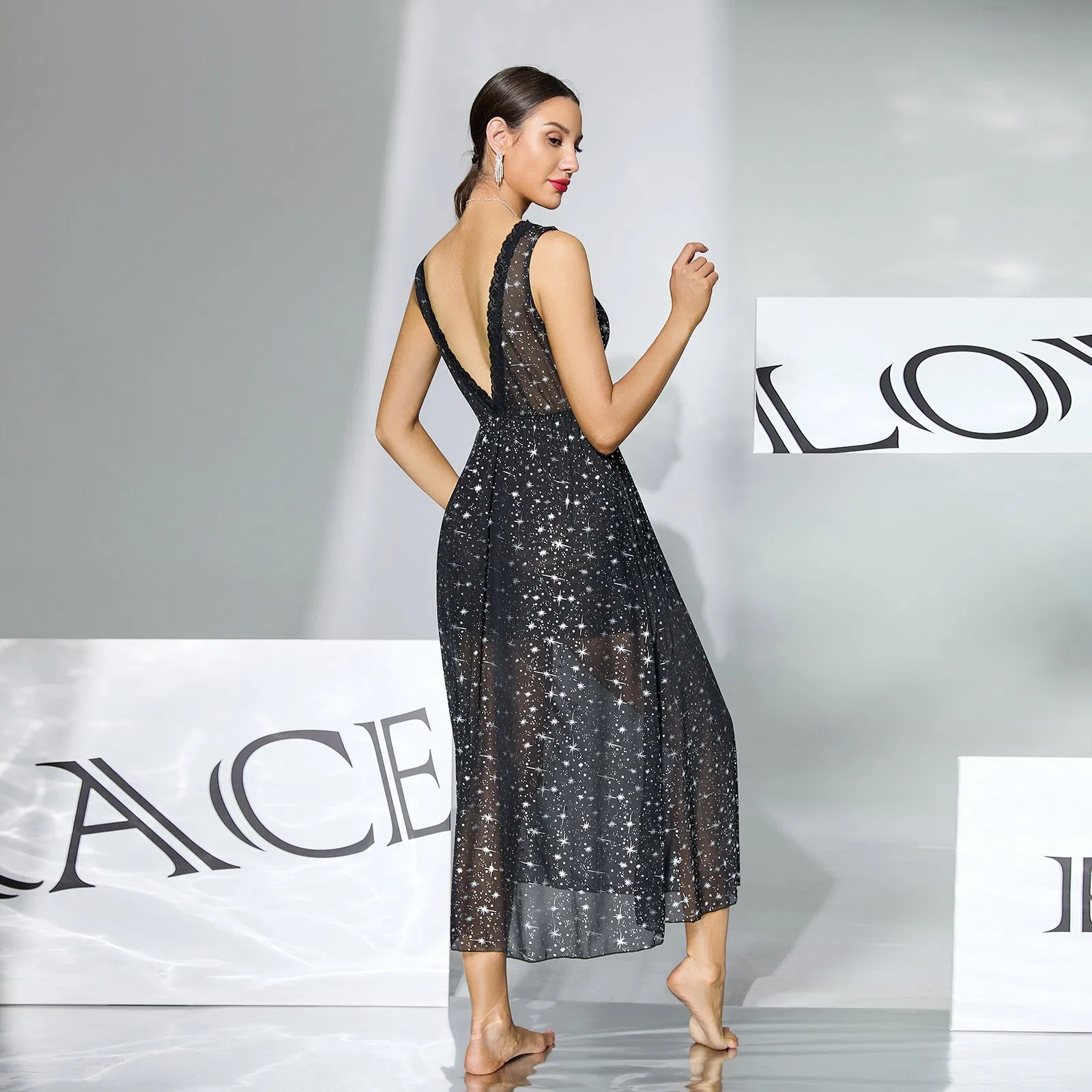 Vestido de dormir de malla brillante estrellada de lujo con espalda profunda y sin espalda, vestido de cita de longitud media para mujer
