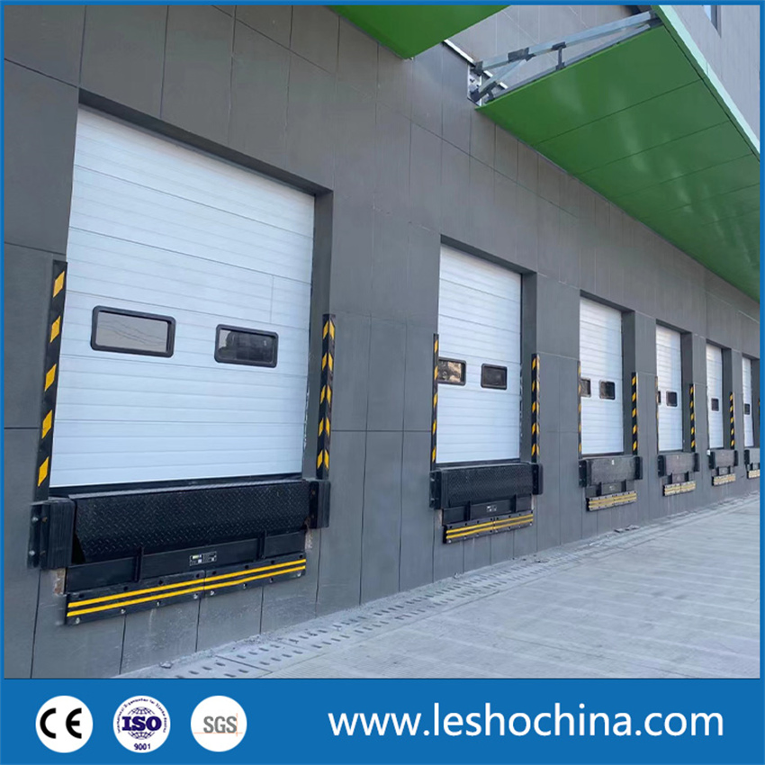 Industrial Automatic Motorized Electrical Sectional Vertical Insulated PU Sliding up Overhead Lifting Rolling up Dock Garage Door for Warehouse Loading Area Bay