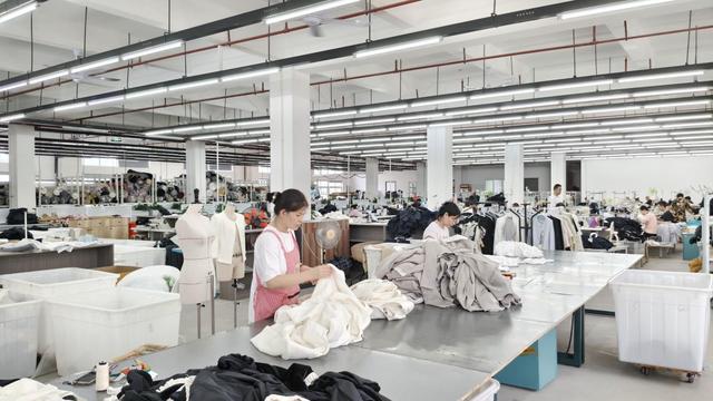 Finished garments awaiting final commercial labeling and quality stamp
