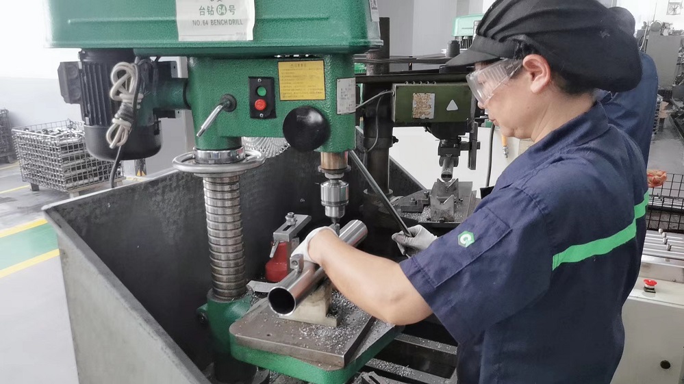 Precision drilling process for automotive component manufacturing