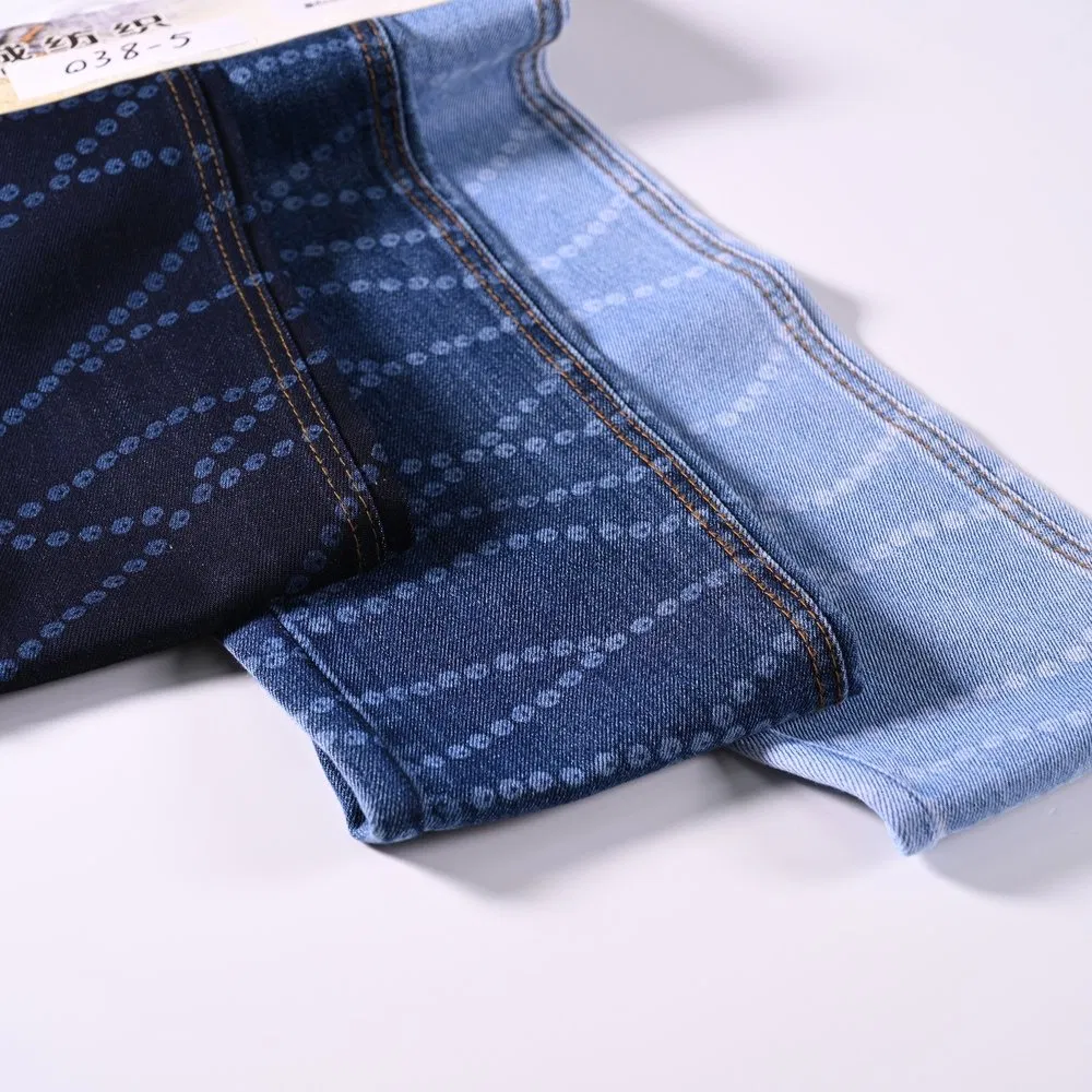 China Made Laser Laser-Cut Patterned Denim Fabric for Eye-Catching Streetwear Apparel