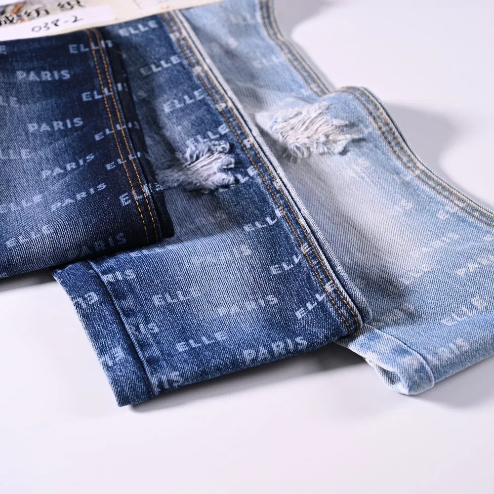 China Made Laser Laser-Cut Patterned Denim Fabric for Eye-Catching Streetwear Apparel