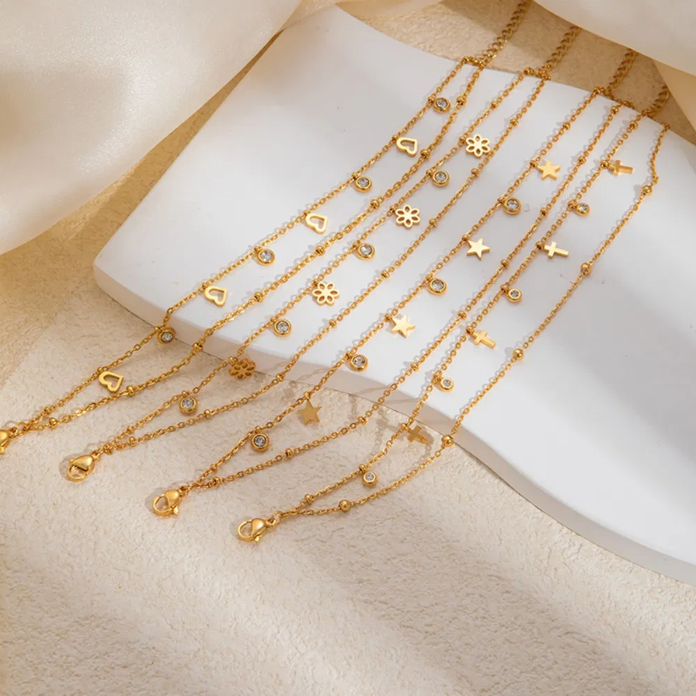 سوار مجوهرات مبيعاً ساخناً 18K سوار جديد مزدوج بسلسلة رقيقة مطلية بالذهب من الفولاذ المقاوم للصدأ مع نجمة وقمر هدية للنساء
