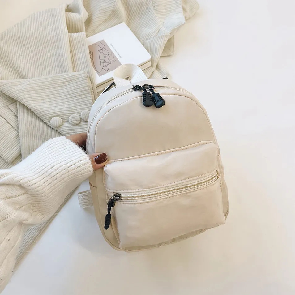 Mochilas Mini Femininas Tendência Nylon Estilo Preppy Bolsas de Viagem para Estudantes Design Personalizado Mochila Pequena para Esportes