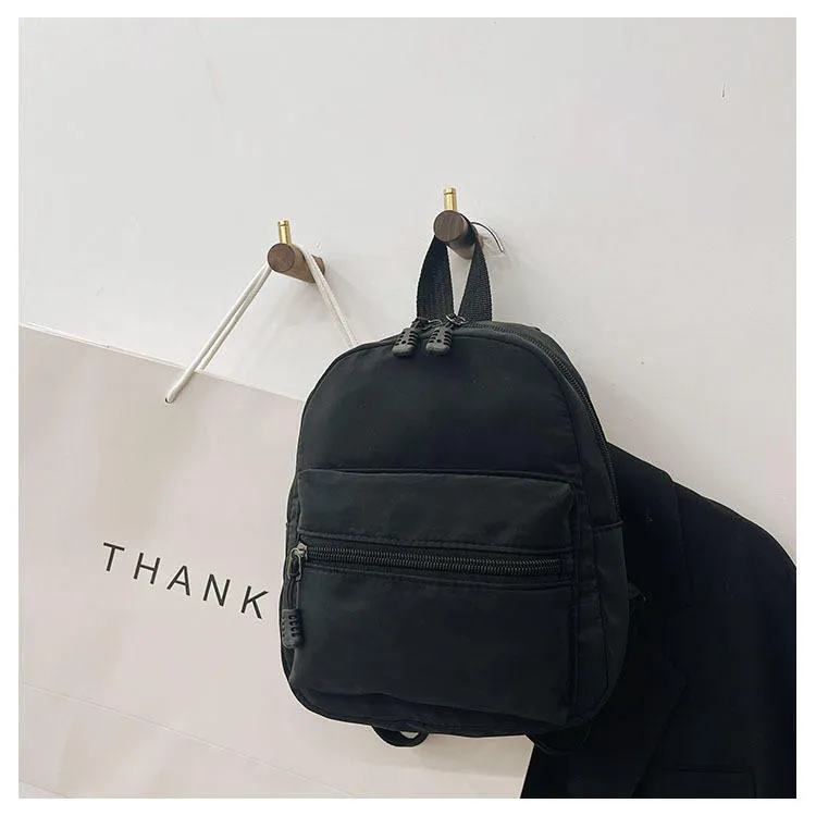 Mochilas Mini Femininas Tendência Nylon Estilo Preppy Bolsas de Viagem para Estudantes Design Personalizado Mochila Pequena para Esportes