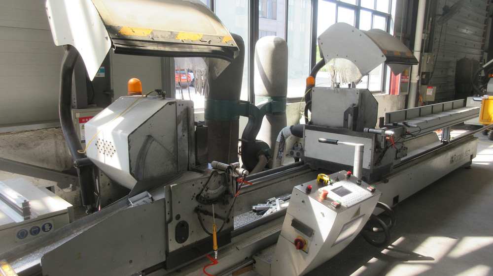 Industrial Metal Cutting Machine - ShieldCraft Workshop