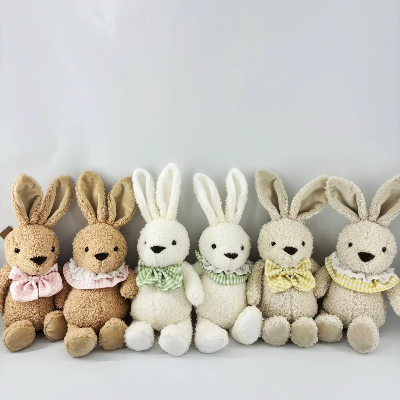 Wholesale Adorable Multi - Colored Sitting Bunny Plush Toys with Bowtie & Ruffle Trims Supplier, Factories