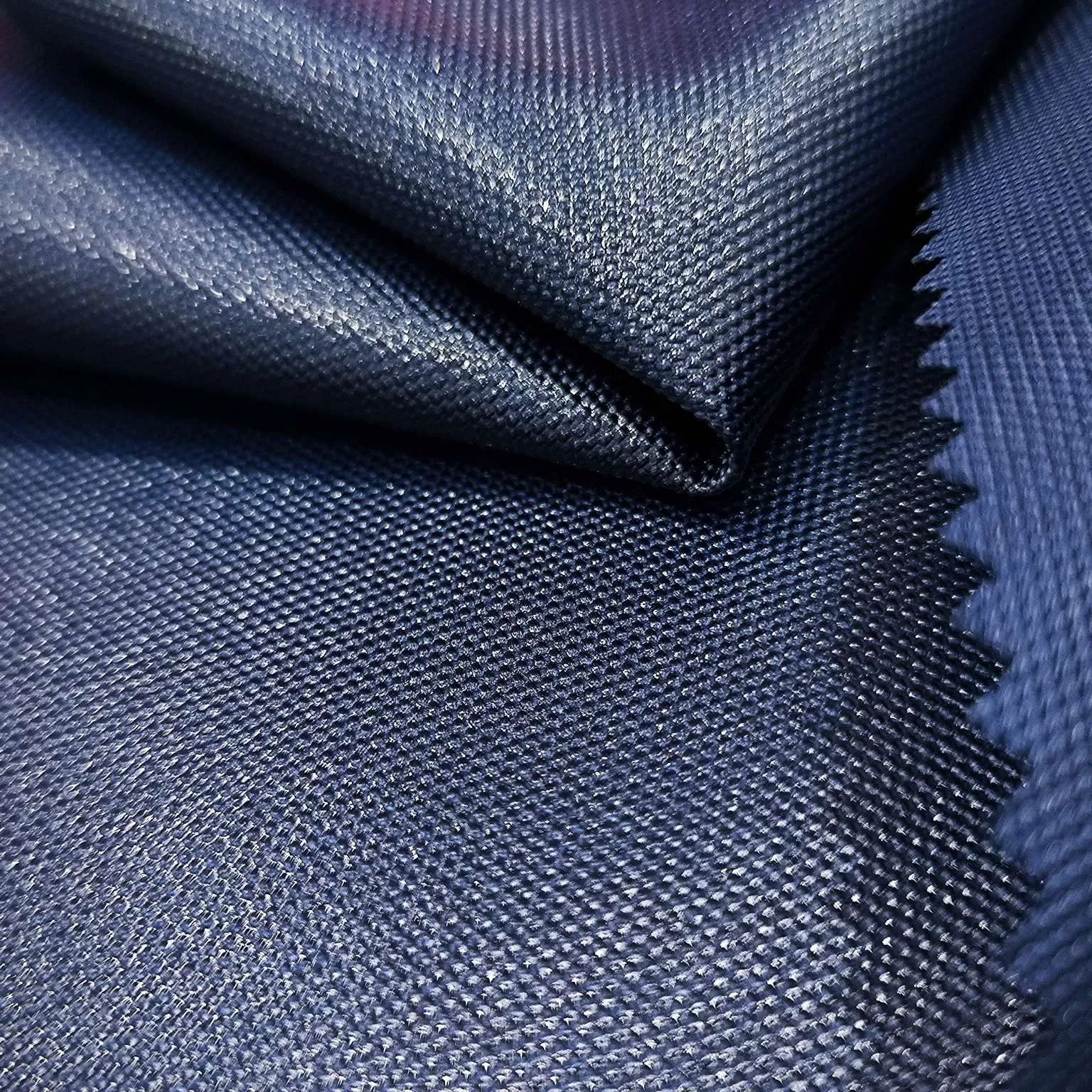 100% Polyester 600d Oxford with Uni-Adhesive Coating Waterproof Navy Fabric for Cases