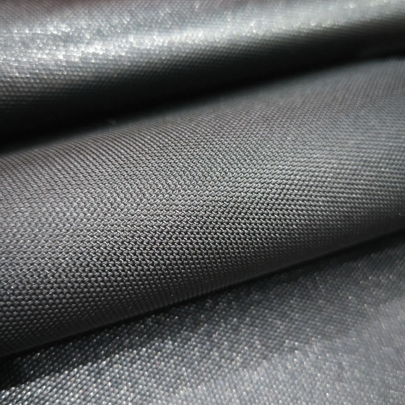 100% Polyester 600d Oxford with Uni-Adhesive Coating Waterproof Blakc Fabric for Luggage