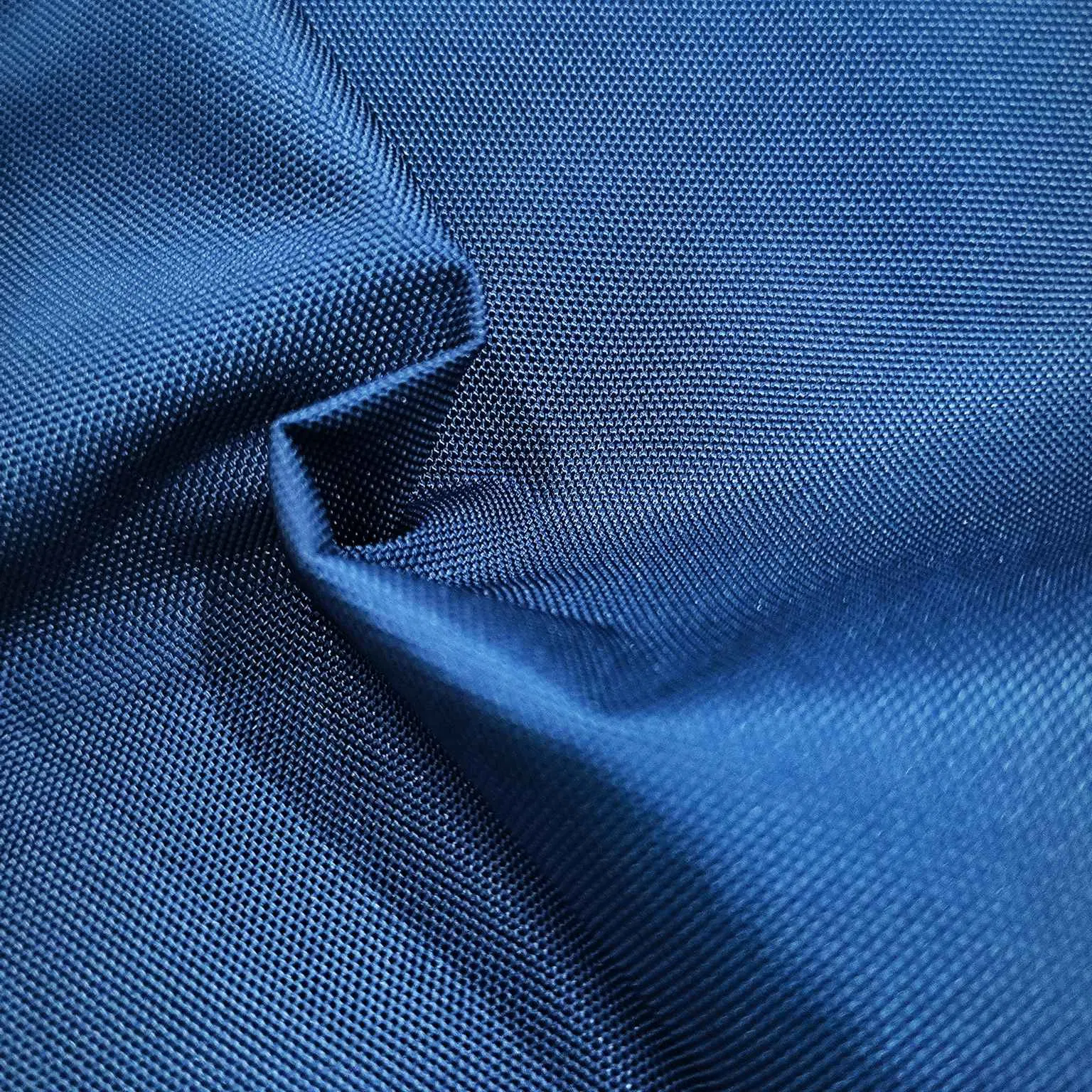 100% Polyester 600d Oxford with Uni-Adhesive Coating Waterproof Navy Fabric for Cases