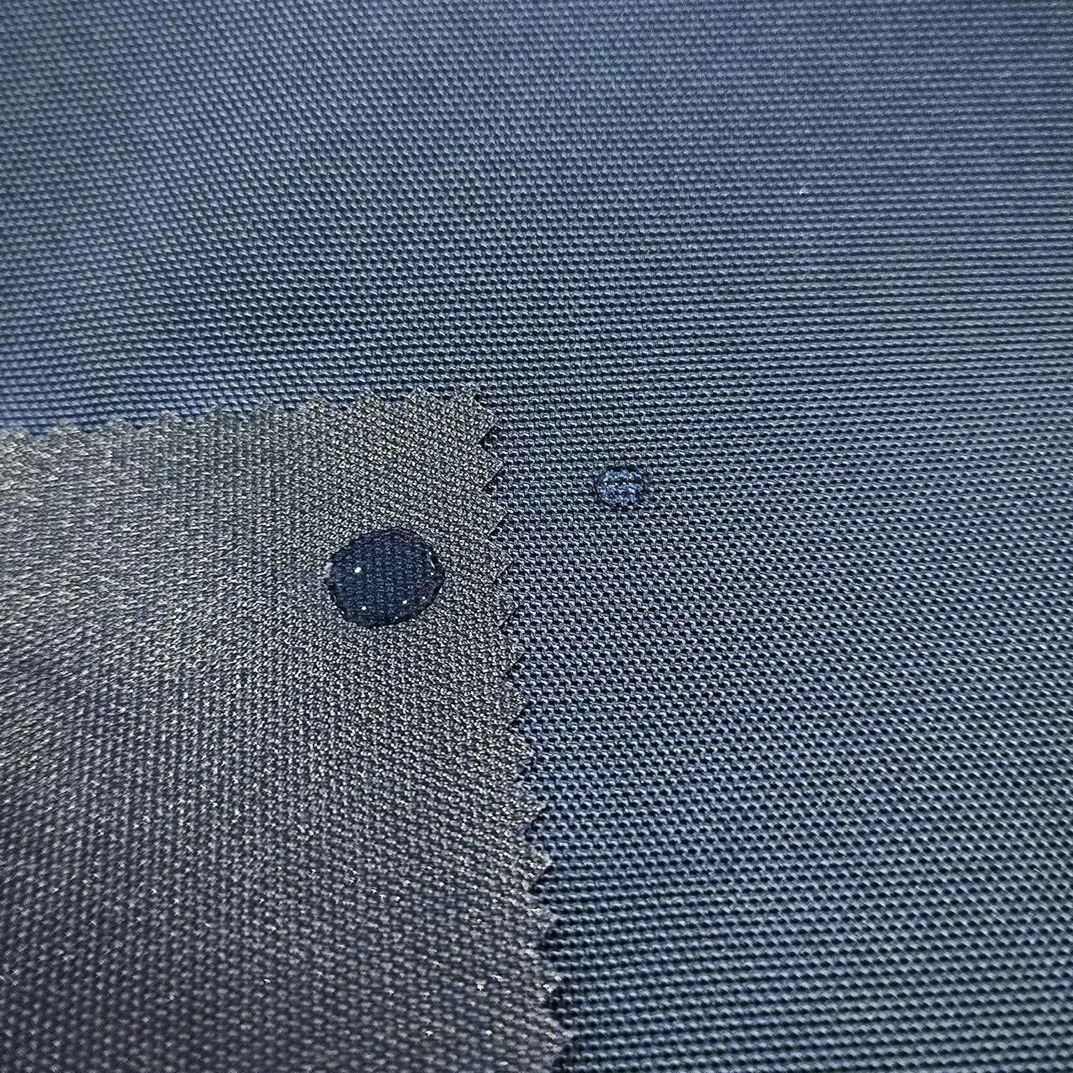 100% Polyester 600d Oxford with Uni-Adhesive Coating Waterproof Navy Fabric for Cases