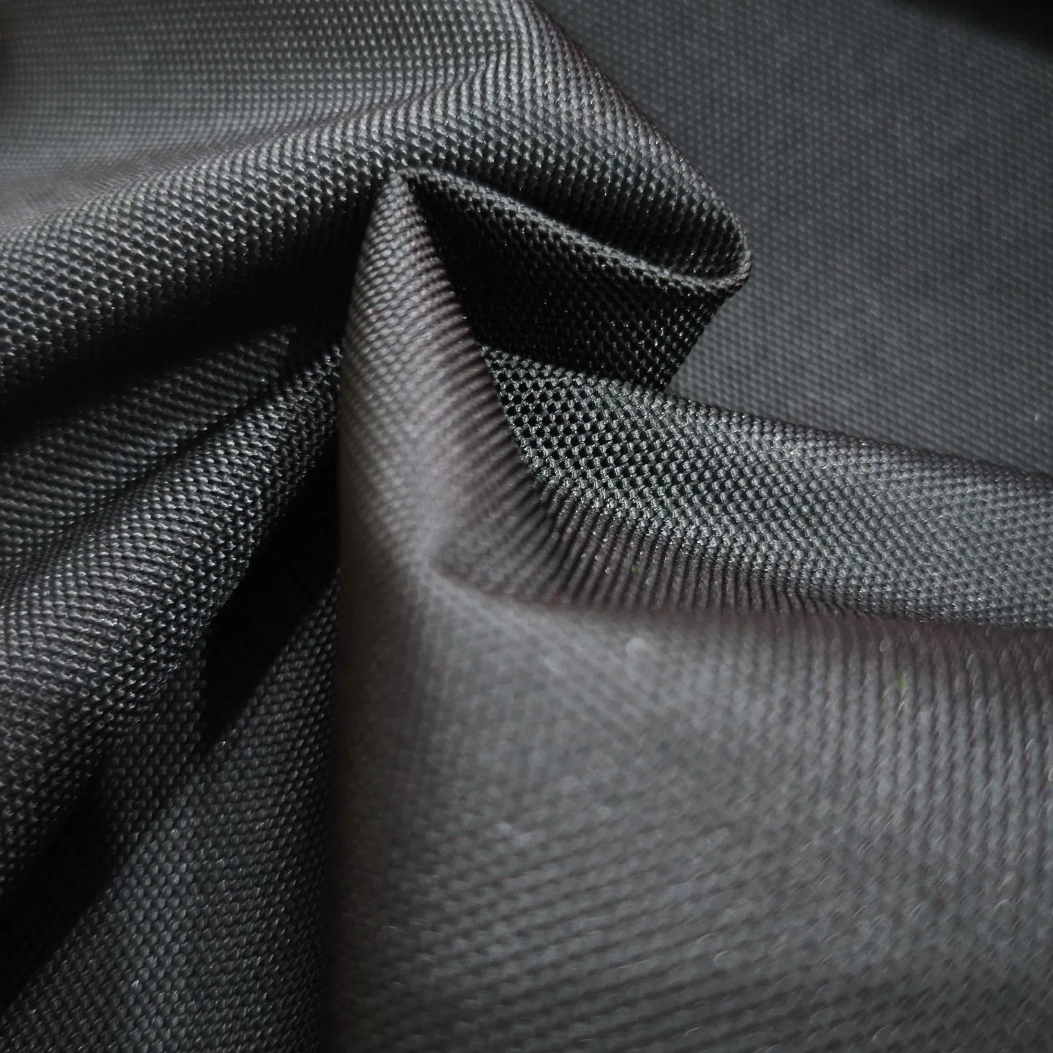 100% Polyester 600d Oxford with Uni-Adhesive Coating Waterproof Blakc Fabric for Luggage