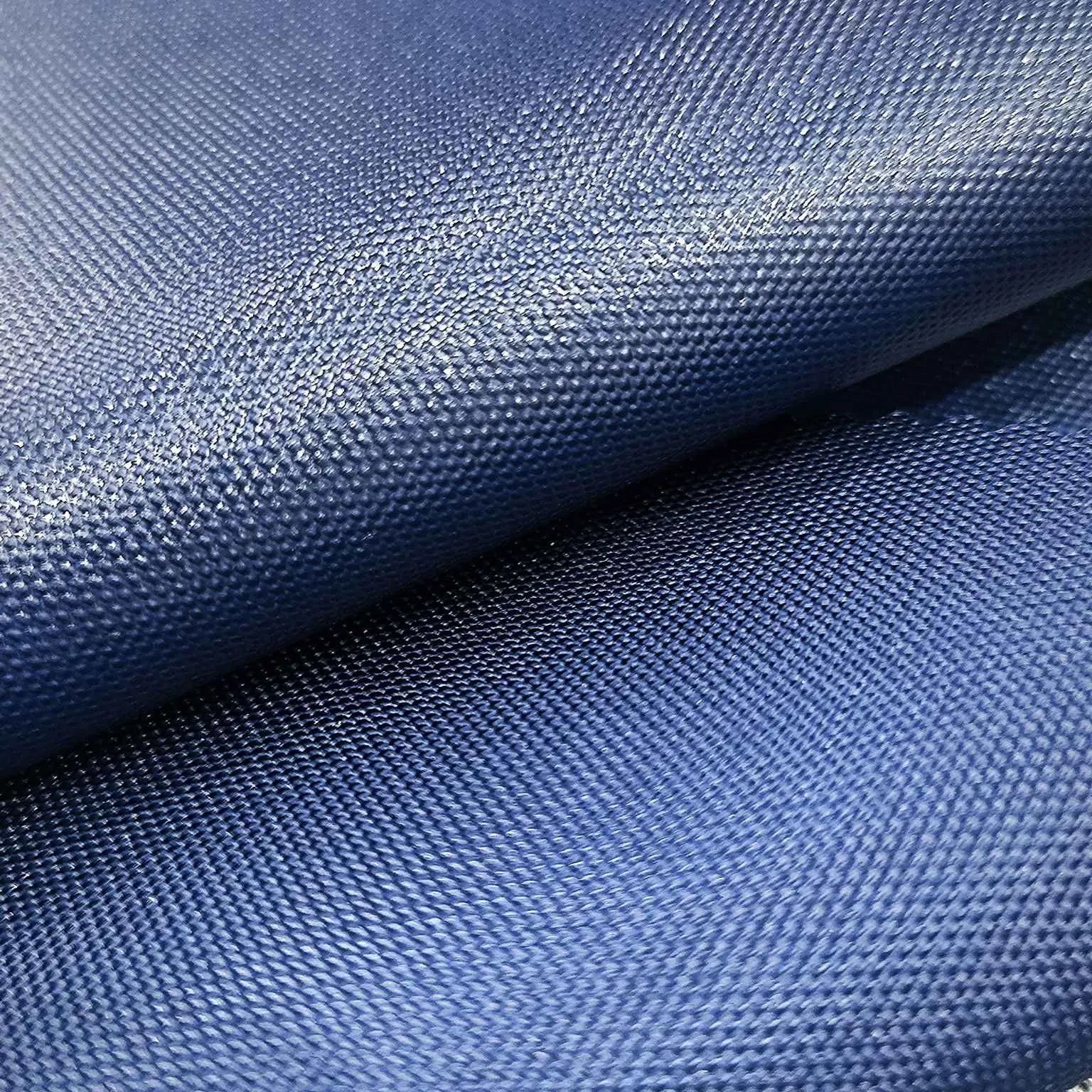 100% Polyester 600d Oxford with Uni-Adhesive Coating Waterproof Navy Fabric for Cases