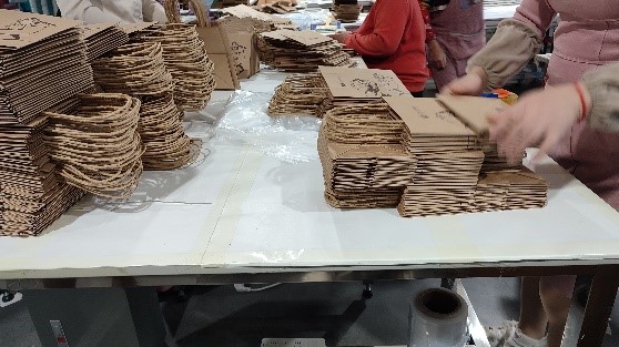 Quality inspection — manual checking of finished bags before packaging at ChicBeauty Bag