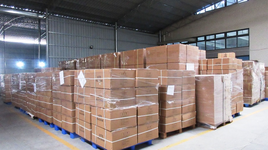 Warehouse storage of finished PP woven bags and kraft paper bags ready for export shipment