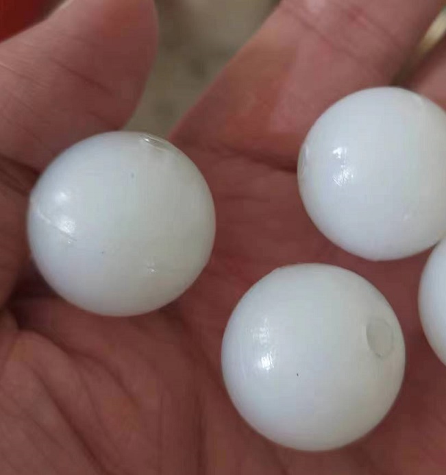 China Round Shape Cast MC Nylon Plastic Ball With Holes For Bearing Wheels Exporter, Product