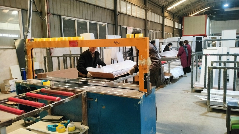 Automated packing line for export-ready racking shipments