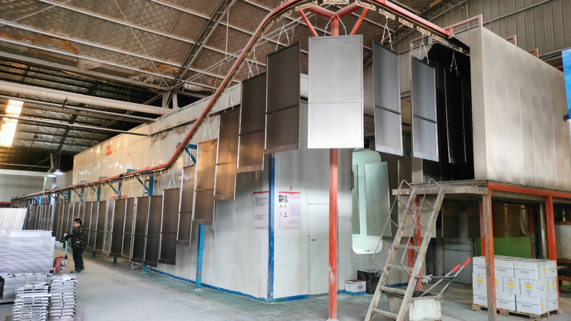 Electrostatic powder coating paint shop for corrosion-resistant racking finish