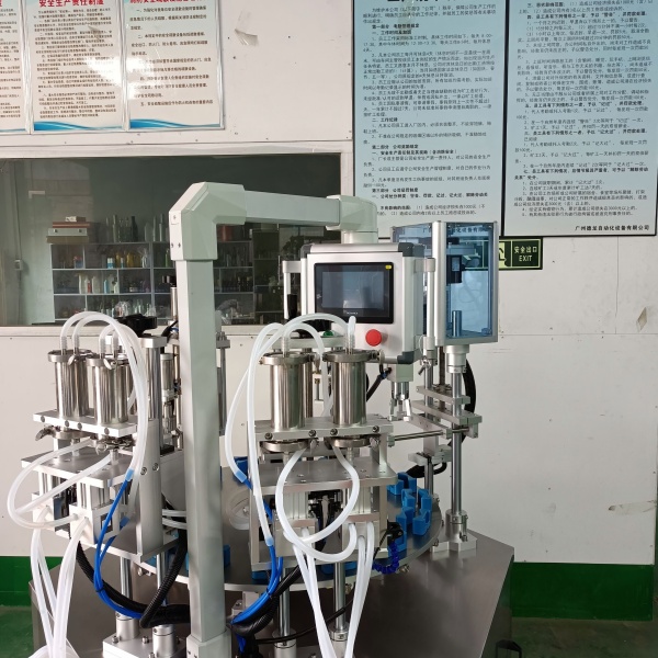 Perfume filling machine 12