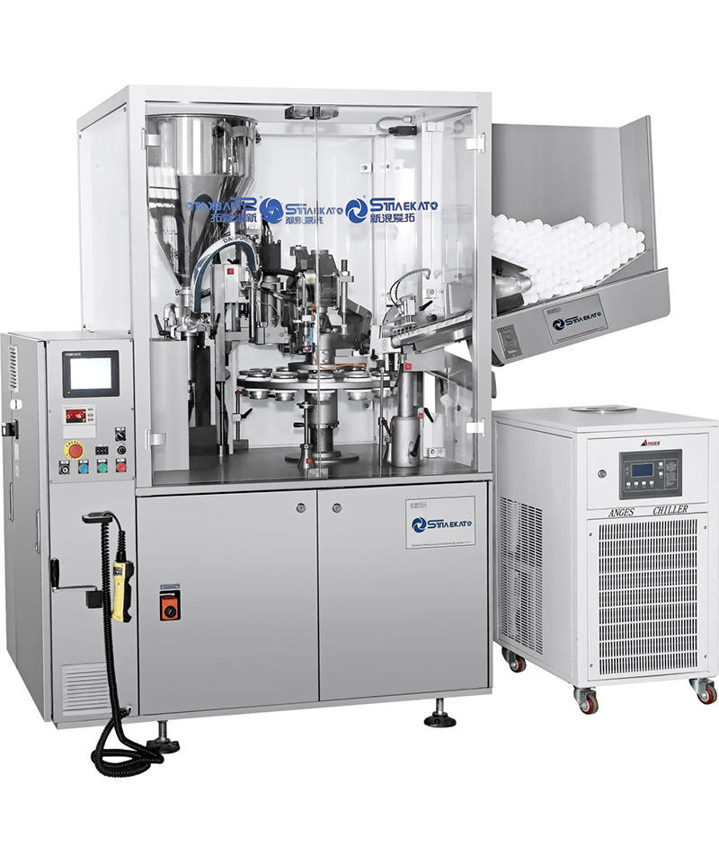 Tube filling and sealing machine