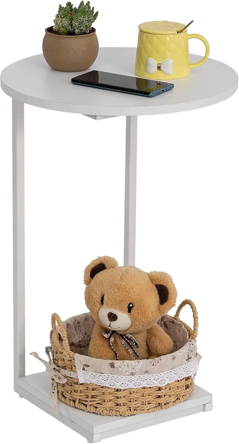 Round Accent Table with a Feline Vase and Coffee Cup for a Bright Reading Nook by The Window