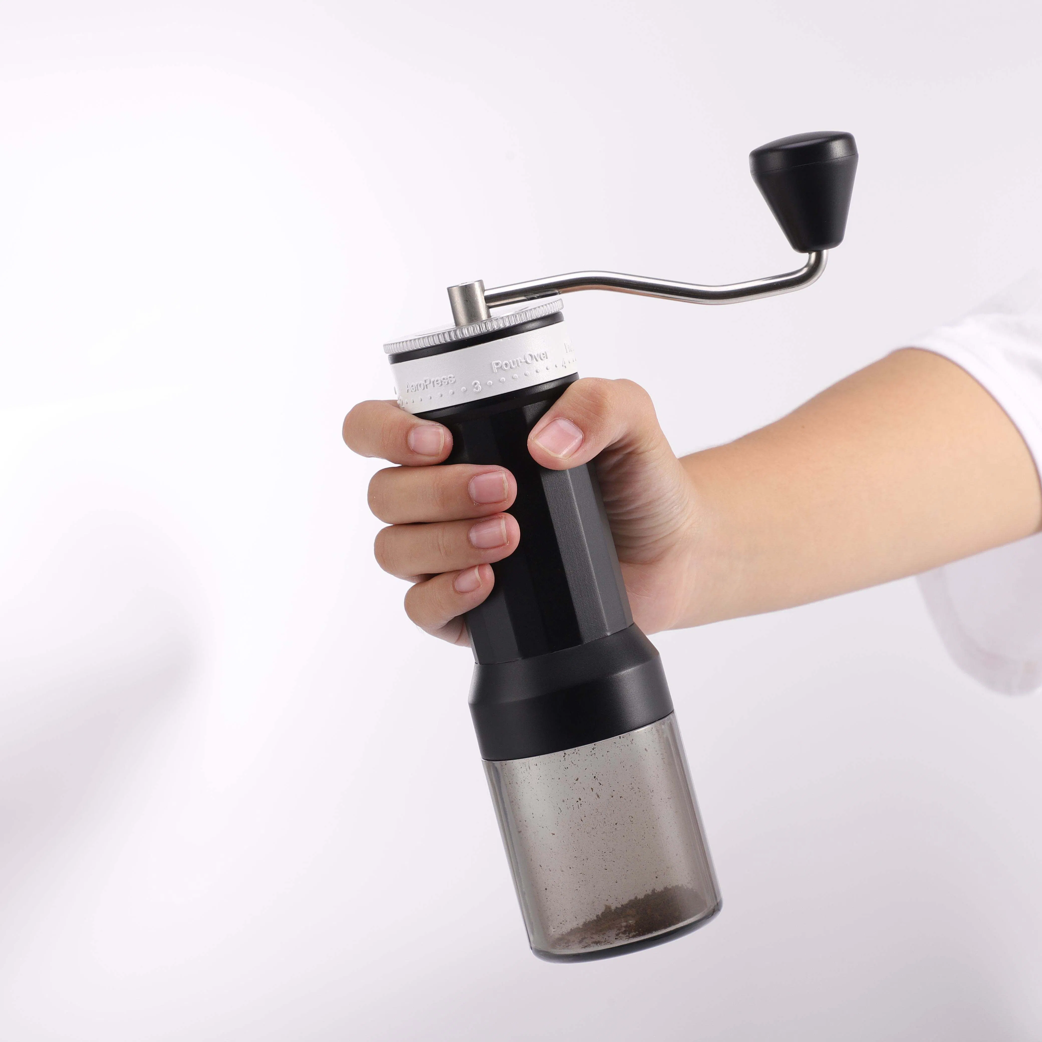 Herramientas de café de venta al por mayor, molinillo de café manual ajustable de acero inoxidable con cuerpo de cerámica