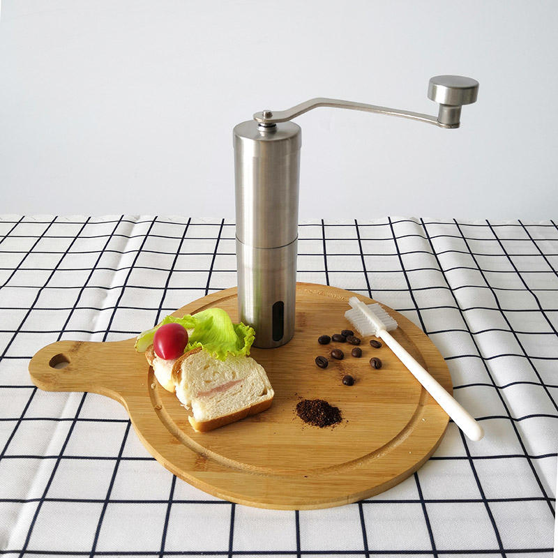 Molino de café manual de acero inoxidable profesional con manivela en la cocina