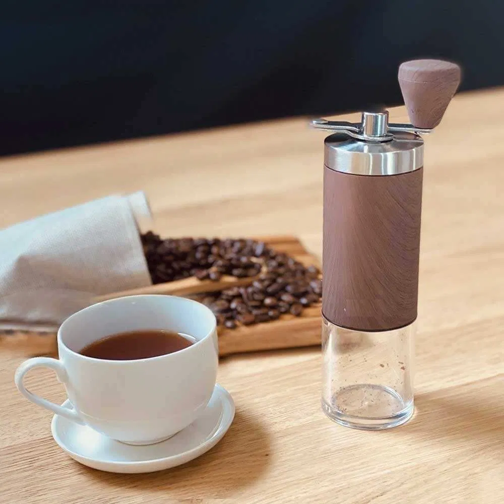 Molino manual Cottee a bajo precio, molino de café manual portátil de acero inoxidable con muelas para espresso