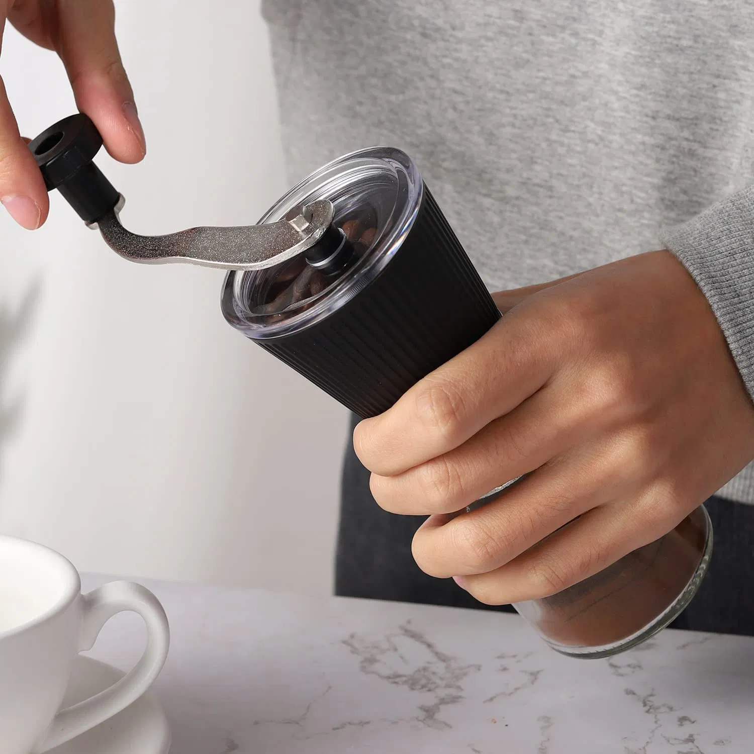 Conjunto de molinillo de café manual y botella para granos de café