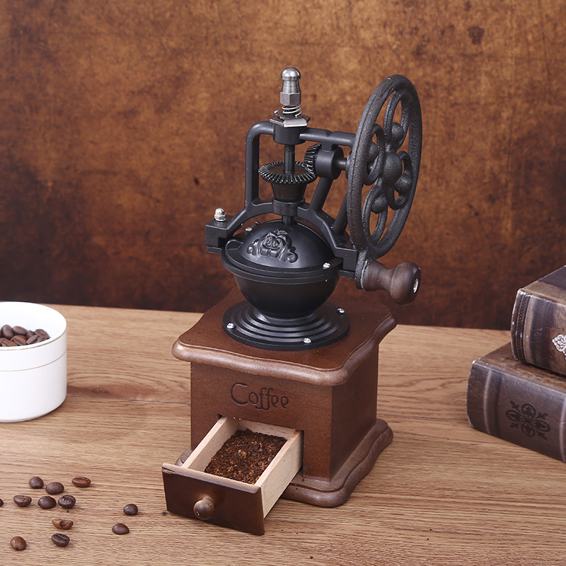 Molino de café manual retro de cocina con diseño de noria antigua