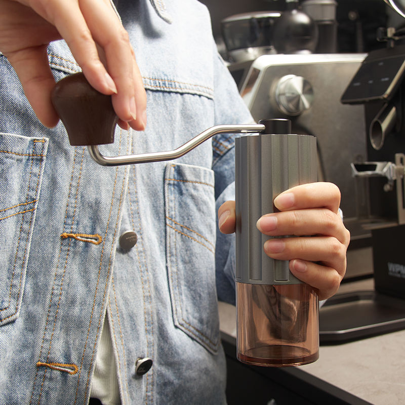Molino de café manual ajustable con cuerpo de ABS y muela cónica