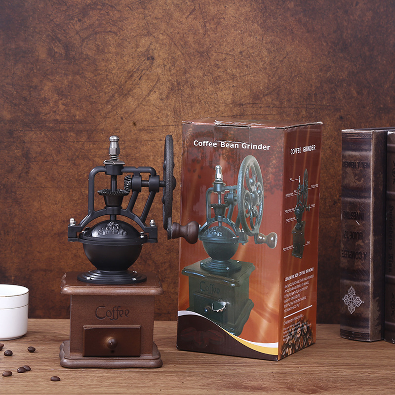 Molino de café manual retro de cocina con diseño de noria antigua