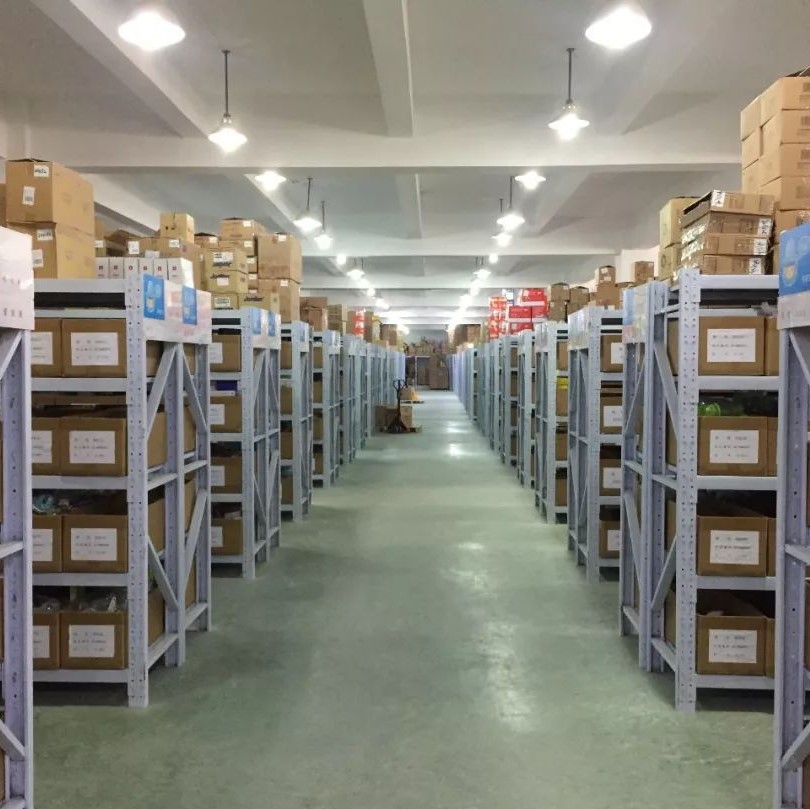 Finished goods warehouse with organized inventory of optical and network equipment at Soras Technology