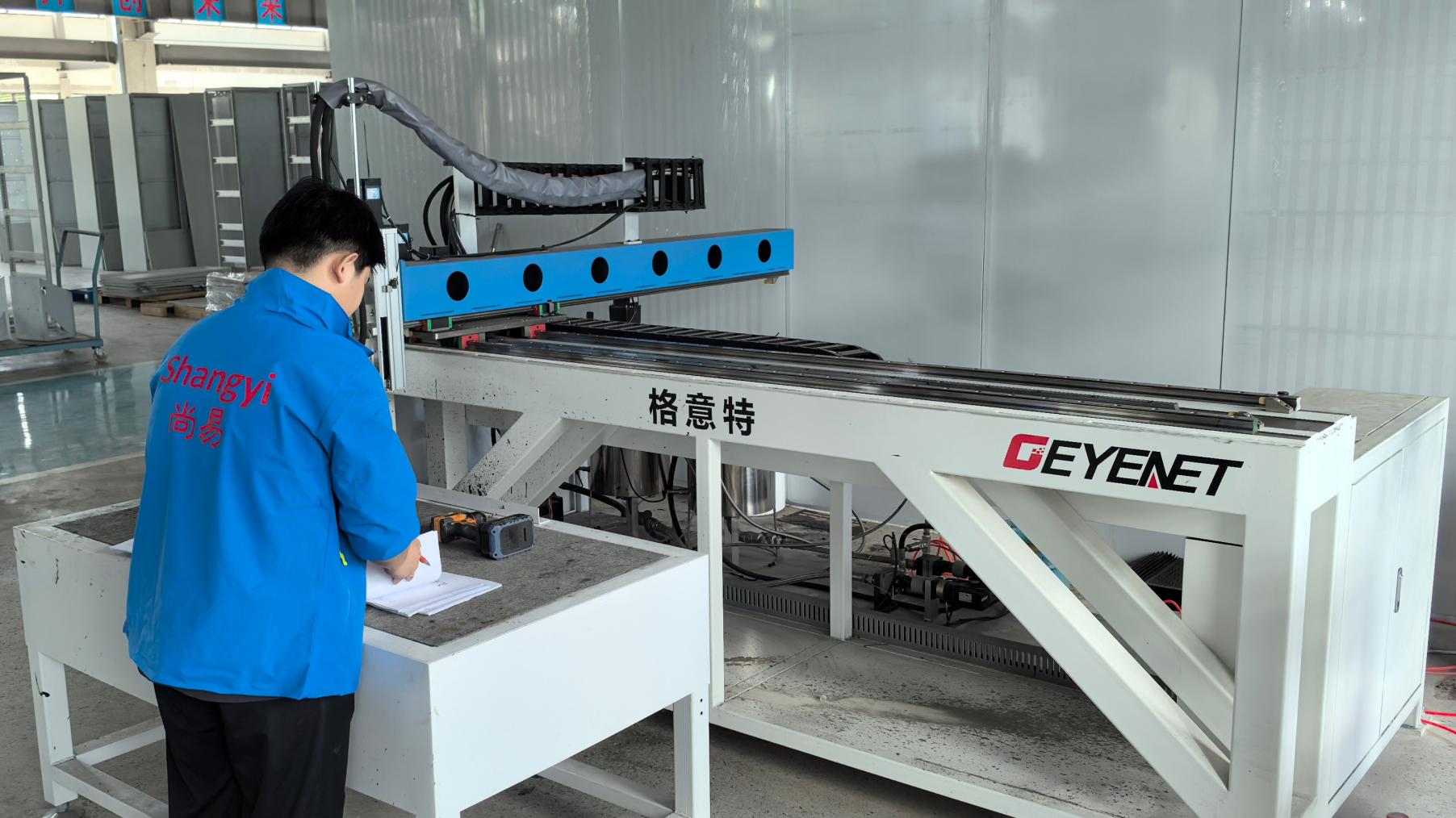 Automated dispensing machine used in PCB assembly at Sowest Electric