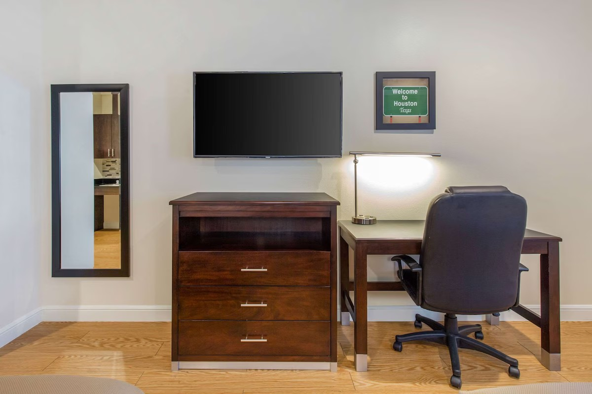 Econo Lodge Inn &amp; Suites Prestige by Choice Deluxe Family Room King Suite Headboard Sconce Nightstand Lamp Floor Standing Lamp