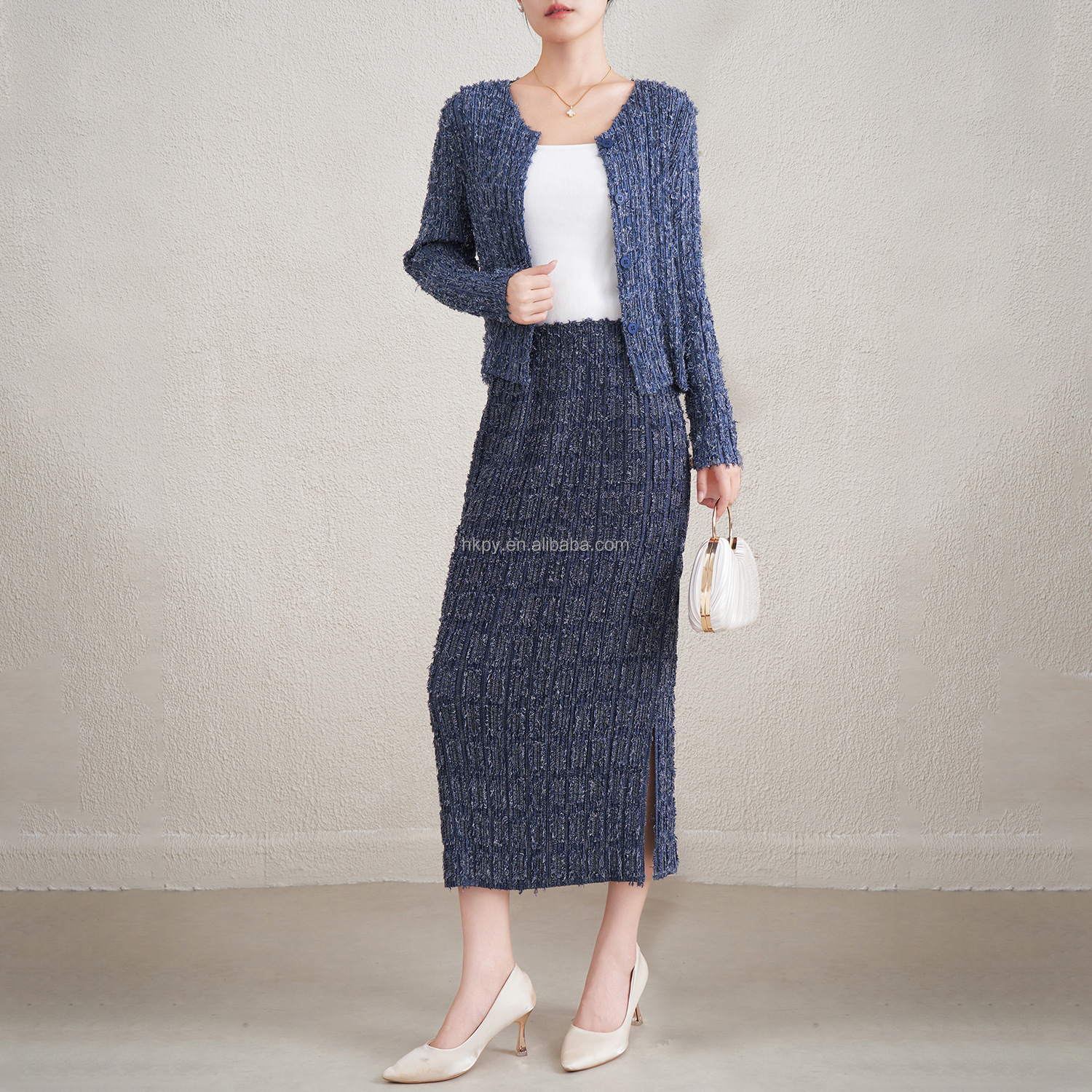 Model wearing pleated suit style 4